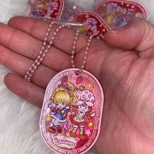 Pink Rainbow Brite and Strawberry shortcake Character Pendant Necklace